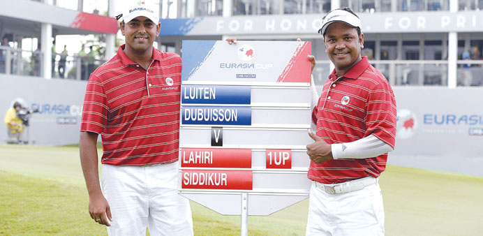 Team Asiau2019s Siddikur Rahman of Bangladesh (right) and Anirban Lahiri of India celebrate afte their win at the EurAsia Cup in Glenamarie Golf and Count