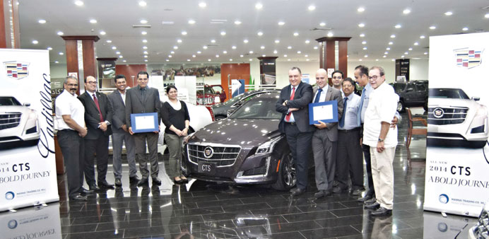 Mannai Auto Groupu2019s fleet division officials and staff.