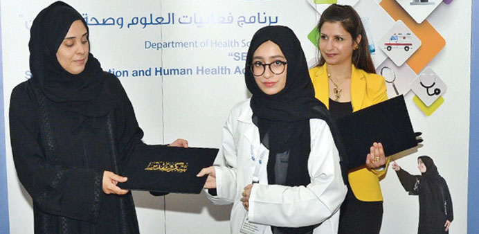 One of the students receive a certificate.