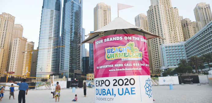 A booth is seen on a beach in Dubai carrying the Expo 2020 logo (file). The event could lead to an influx of 25mn visitors to the emirate, driving new