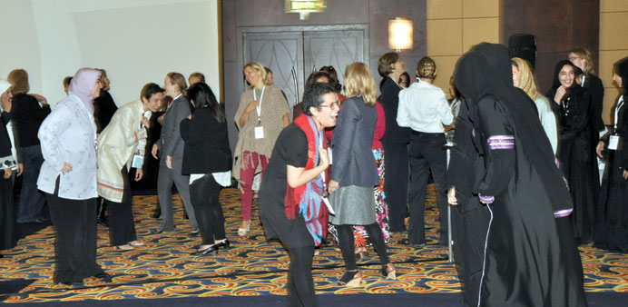 * Laughter Yoga teacher Gabi Pezo conducts a session at HWW conference 2012.