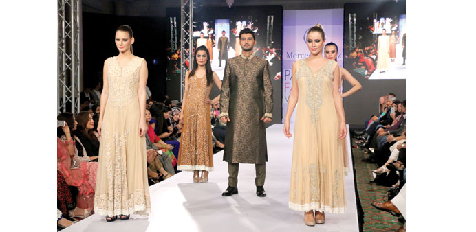  RAMP SHOW: A collection of dresses by Deepak and Fahad.     Photo by Umer Nangiana