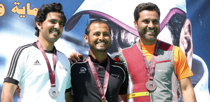 Winners of the menu2019s skeet event of the Emir Cup for Shooting and Archery Cup celebrate on the podium. 