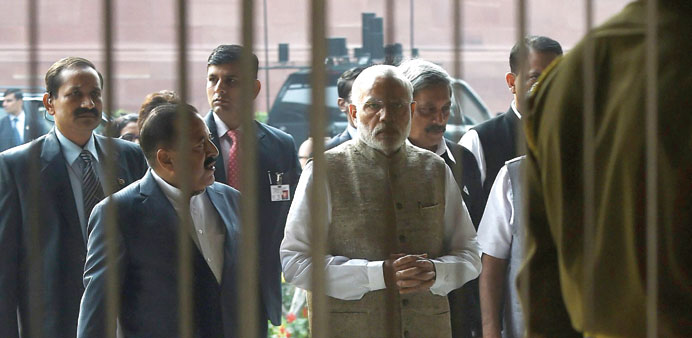 Prime Minister Narendra Modi arrives for the inauguration of an exhibition during the opening of the winter session of parliament in New Delhi yesterd