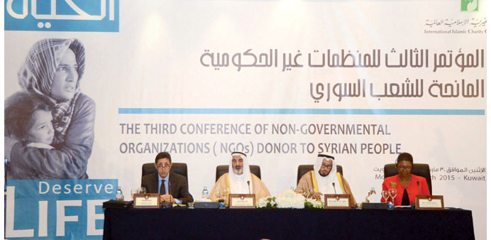 UN humanitarian affairs chief Valerie Amos and special envoy Abdullah al-Maatuq (second right) attend the conference of non-governmental organisations