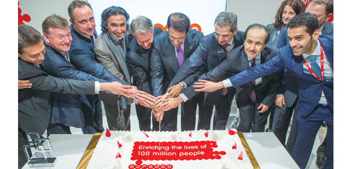HE Sheikh Abdulla, Ooredoo Group CEO Dr Nasser Marafih and CEOs of group companies jointly cut a cake to mark the milestone achievement at the Mobile 