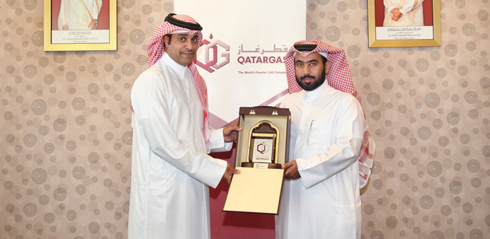 Mansour Rashid al-Naimi, public relations manager of Qatargas with Ali Mubarak al-Kubaisi, fundraising manager of Qatar Charity.