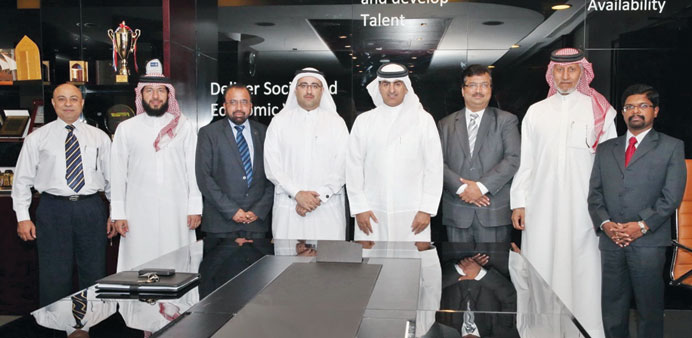  Qafac and IIA-Qatar officials at the ceremony.