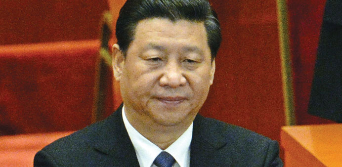 Chinese President Xi Jinping applauds at the closing session of the National Peopleu2019s Congress at the Great Hall of the People in Beijing on Thursday.