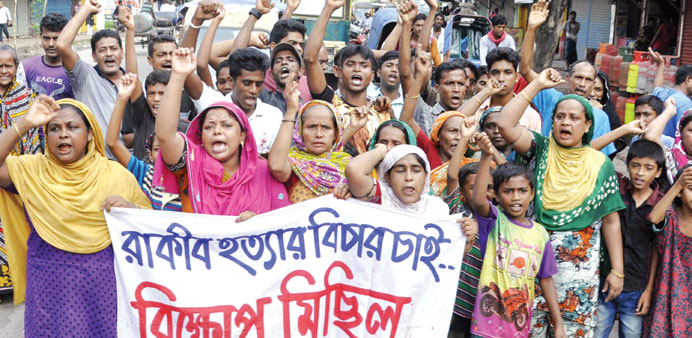 Protesters gather during a demonstration against the killing of a 13-year-old boy in Khulna yesterday. 