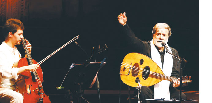 Composer and singer Marcel Khalife performs with cello player Sari Khalife during the Baalbek festival, which was held in La Magnanerie, a 19th centur