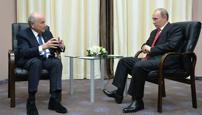 Russian President Vladimir Putin (R) meets with FIFA President Joseph Sepp Blatter in Sochi