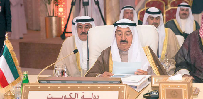 Emir of Kuwait Sheikh Sabah al-Ahmed al-Jaber al-Sabah addressing the 24th Arab Summit in Doha yesterday.