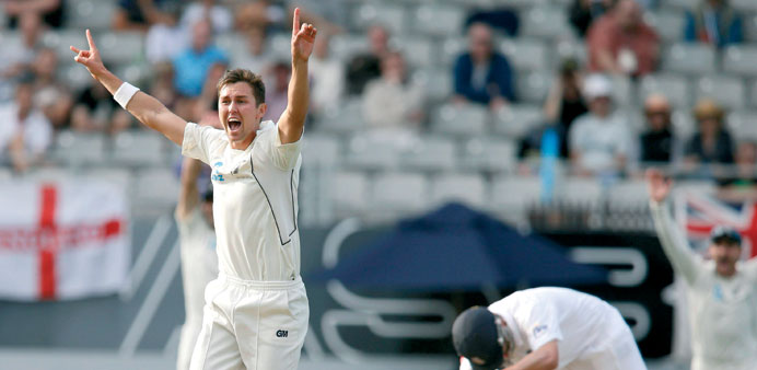 New Zealandu2019s Trent Boult (left) appeals successfully for the wicket of Englandu2019s Jonathan Trott (right) on day two of their final cricket Test at Ede