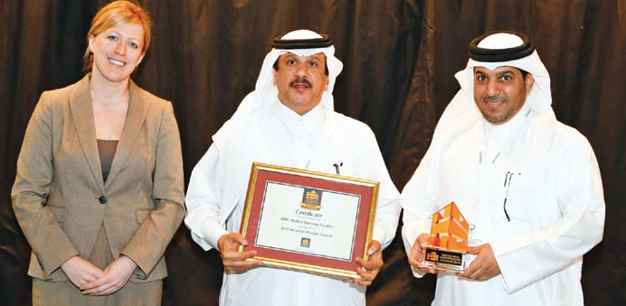 HMC officials pose with the award plaque and certificate during the event in Dubai.