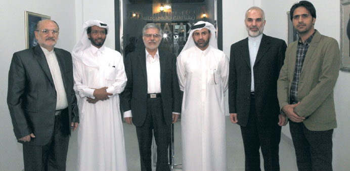  Dr al-Sulaiti (third right) with the Iranian officials and the artist.