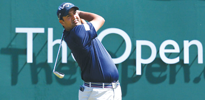 Indiau2019s Shiv Kapur drives during the 2013 British Open on Saturday. (AFP)