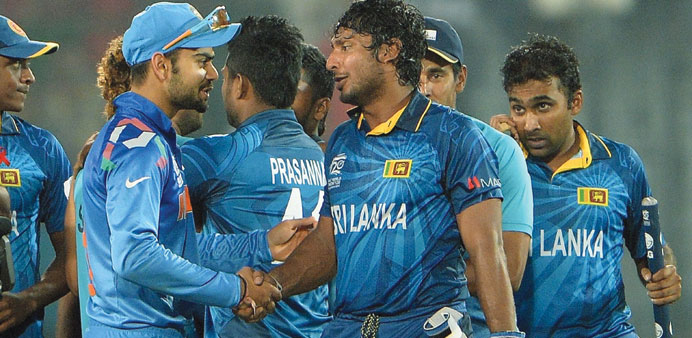  Indiau2019s Virat Kohli (left) congratulates Sri Lankau2019s Kumar Sangakkara for his match-winning knock. It was Sri Lankau2019s maiden World Twenty20 title. (A