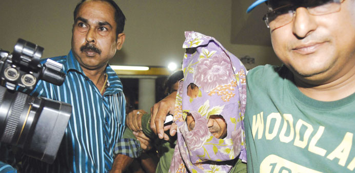 Police take suspect Mohamed Salim Sheikh to a court in Kolkata yesterday.