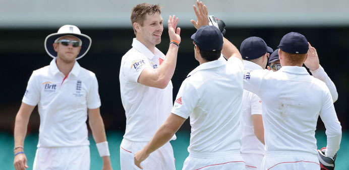 England's Boyd Rankin (2nd left) celebrates the wicket of James Muirhead during his side's tour match against Cricket Australia Invitational XI in Syd