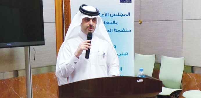 Sheikh Dr Mohamed bin Hamad al-Thani speaking at the workshop.