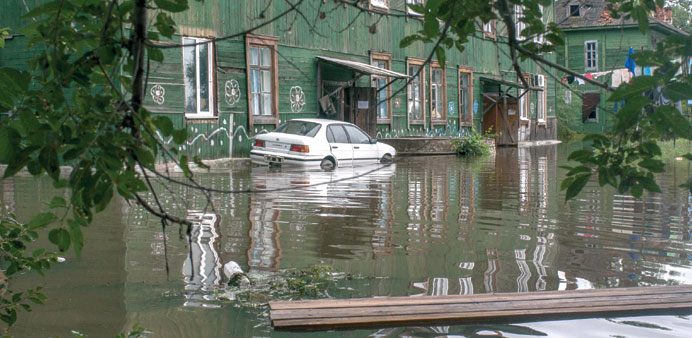 A submerged car is seen at the village of Bolshoi Ussuriysky.