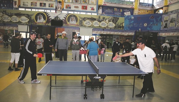 HE the Minister of Transport and Communications Jassim Seif Ahmed al-Sulaiti playing table tennis.