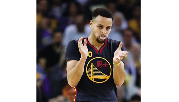 Stephen Curry reacts after scoring a basket against Houston.