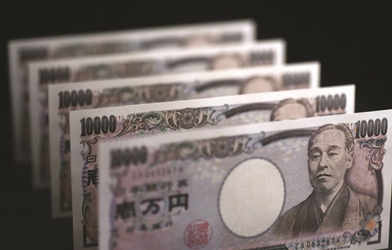 Japanese yen notes are arranged for a photograph in Tokyo. The yen has surged this year as haven assets benefited from a global stock slump and concern that the creditworthiness of global banks is worsening.
