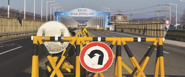 A barricade is set on the road leading to North Koreau2019s Gaeseong joint industrial complex at a South Korean military checkpoint in the border city of Paju near the demilitarised zone dividing the two Koreas. Seoulu2019s plan to withdraw all companies from the industrial complex will affect more than 120 South Korean firms employing about 54,000 North Korean workers at the complex that sits just north of the heavily armed border between the countries.