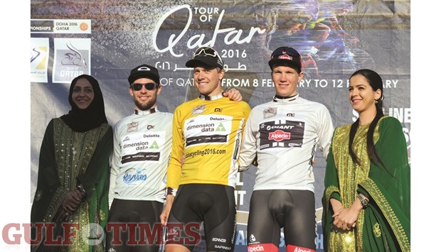 WINNERS, ALL: Stage III winner Edvald Boasson Hagen of Norway (yellow) is flanked by Dimension Data teammate Mark Cavendish and Young Rider of the Day Soren Kragh Andersen on the podium after the end of the third stage, a 11.4km individual time trial, of the 2016 Tour of Qatar yesterday. The time trial was held at the Losail Circuit. PICTURE: Jayaram