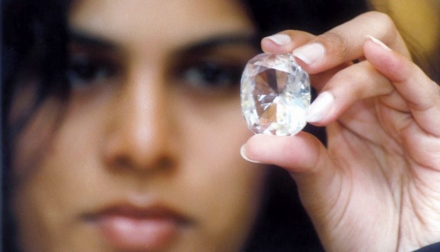  A file picture taken on May 19, 2002 shows executive director of Jewels de Paragon Pavana Kishore holding the Koh-i-Noor diamond on display at an exhibition in India.