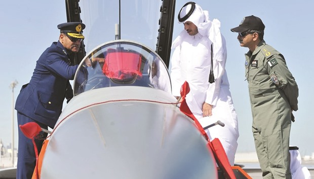 Air Chief Marshal Sohail Aman, left, briefing HE the Prime Minister Sheikh Abdullah bin Nasser bin Khalifa al-Thani about the JF-17 Thunder yesterday in Doha.