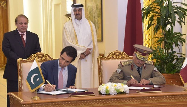 HH the Emir Sheikh Tamim bin Hamad al-Thani and Pakistanu2019s Prime Minister Nawaz Sharif witnessing the signing of MoUs for academic research and health.