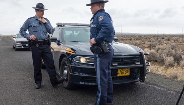 Oregon State Police monitor a checkpoint near the Malheur Wildlife Refuge near Burns, Oregon in this file photo.
