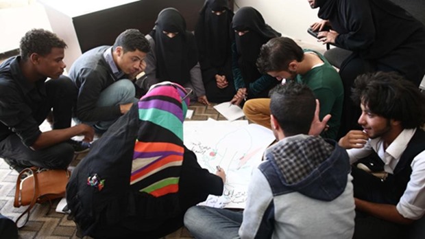 A group of Yemeni youth engaged in an exercise during the training.