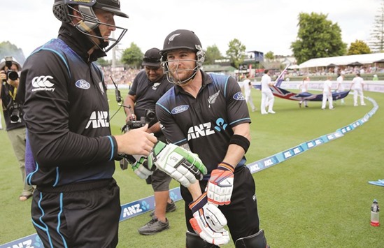 New Zealandu2019s Martin Guptill (left) and Brendon McCullum get ready for their innnings during the third ODI against in Hamilton earlier this month. (AFP)