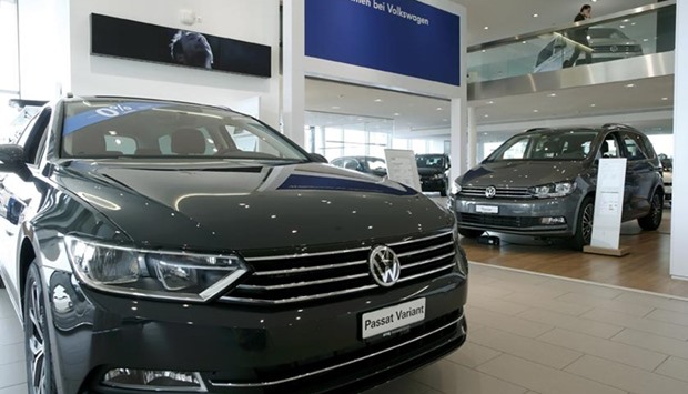 The logo of German carmaker Volkswagen is seen on a Volkswagen Passat car at a showroom of Swiss car importer AMAG in Duebendorf on Friday.