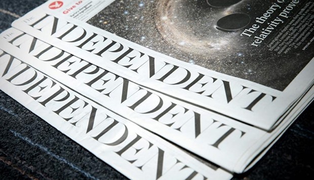 Copies of The Independent are seen in London on Friday.