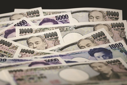 Japanese yen banknotes of various denominations are arranged for a photograph in Tokyo. The yen has outperformed all 31 other major currencies this year as Japanu2019s current-account surplus makes it attractive for investors seeking a haven.