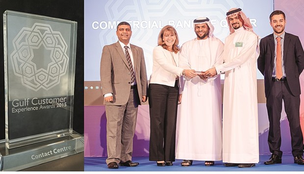 Commercial Bank officials receive the award during the Gulf Customer Experience Awards 2015.