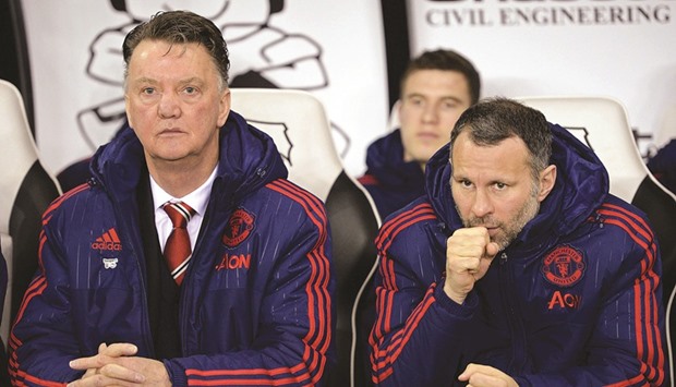 Manchester Unitedu2019s manager Louis van Gaal (left) and his assistant Ryan Giggs. (AFP)