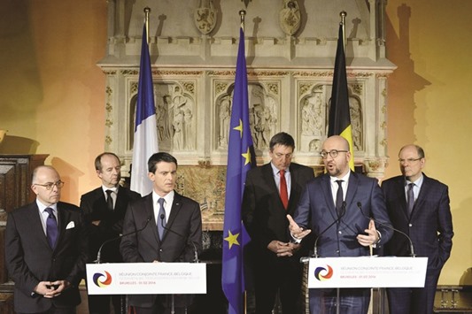 (From left) French Interior Minister Bernard Cazeneuve, French Justice Minister Jean-Jacques Urvoas, French Prime Minister Manuel Valls, Vice-Prime Minister and Interior Minister Jan Jambon, Belgian Prime Minister Charles Michel and Minister of Justice Koen Geens talk to the press after a French-Belgian meeting in Brussels on the fight against terrorism.