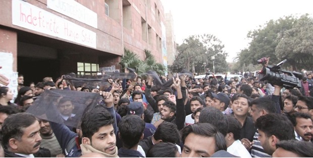 ABVP students show black flags in protest against the visit of Congress vice president Rahul Gandhi to the Jawaharlal Nehru University yesterday.