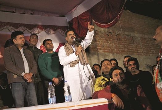Sanjeev Balyan, the federal minister of state for agriculture and a BJP leader, addresses a by-election campaign rally in Muzaffarnagar district in Uttar Pradesh.