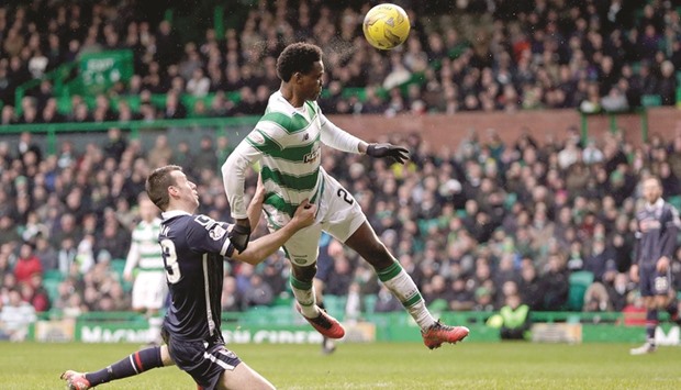 Celticu2019s Dedryck Boyata (No 2) scored their second goal against Ross Country.