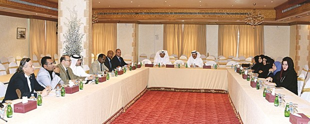 Members of the Education Committee of Qatar Chamber hold a meeting.