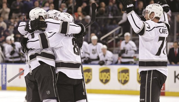 The Los Angeles Kings celebrate a goal scored by Anze Kopitar (11) during the third period against the New York Rangers at Madison Square Garden.
