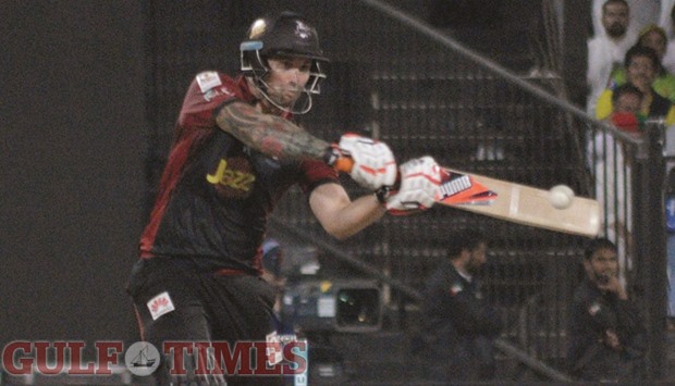 Lahore Qalandars allrounder Cameron Delport scored 78 before taking three wickets in the match against Peshawar Zalmi in the Pakistan Super League yesterday. (Right) Quetta Gladiators bowler Grant Elliot took a career-best four for 15. (PSL)