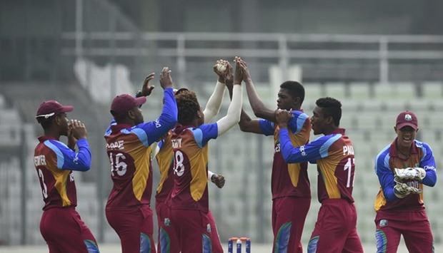 West Indiesu2019 Alzarri Joseph (third right) celebrates the dismissal of Indiau2019s Anmolpreet Singh during the Under-19 World Cup cricket final at the Sher-e-Bangla stadium in Dhaka on Sunday.